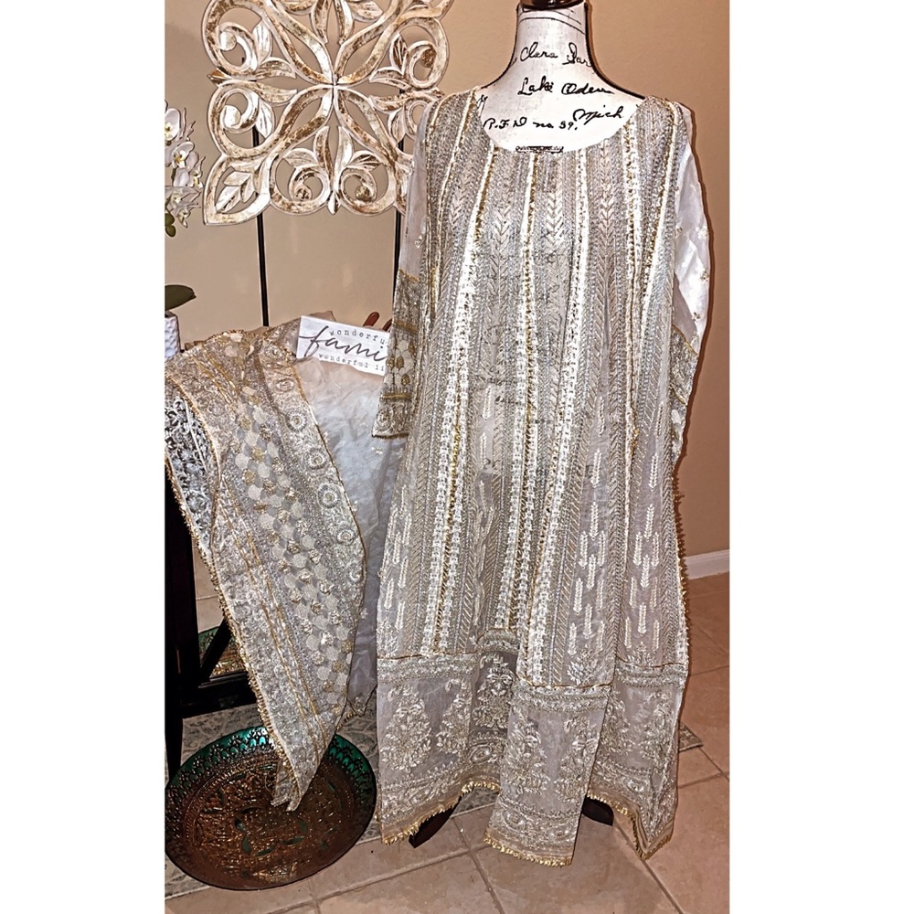 White and gold all embroidered with gotta